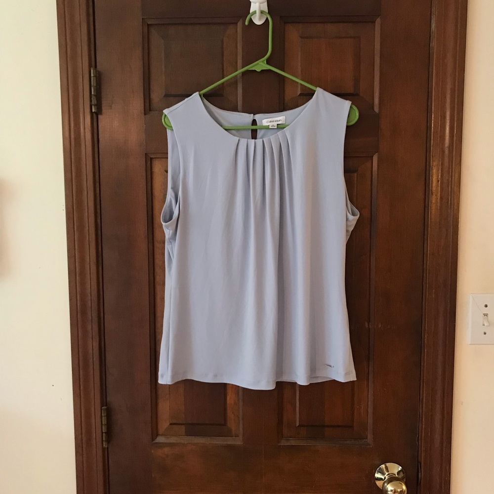 Light blue-ish gray sleeveless top.